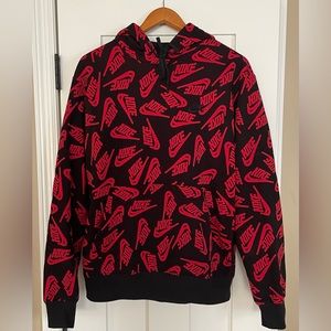 Nike Hoodie. Black/Red Nike Swoosh pattern. Size medium. Fantastic condition.